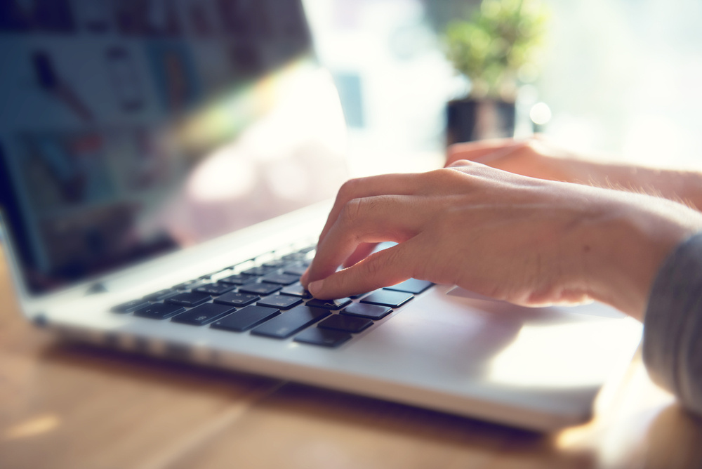 typing-on-a-laptop typing-on-a-laptop