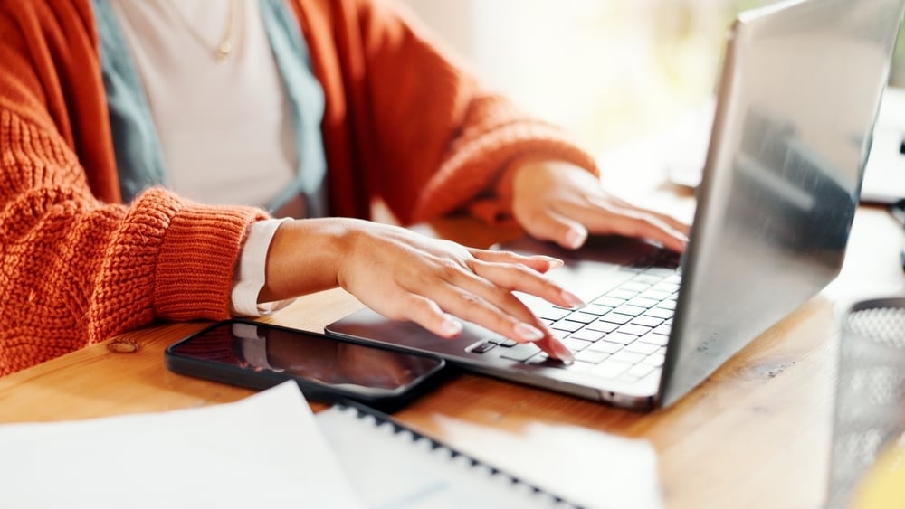 woman-typing-on-a-laptop